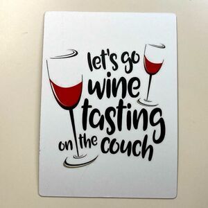 “Let’s go wine tasting on the couch” magnet